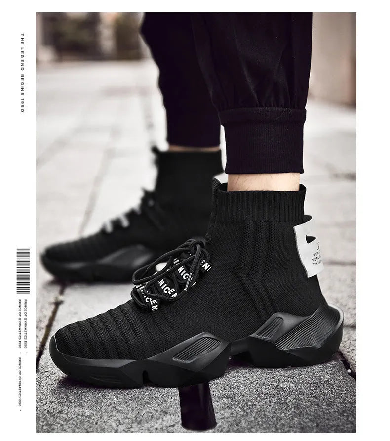 Men's black and white sports-style casual shoes with mesh lining, shown in large sizes.
