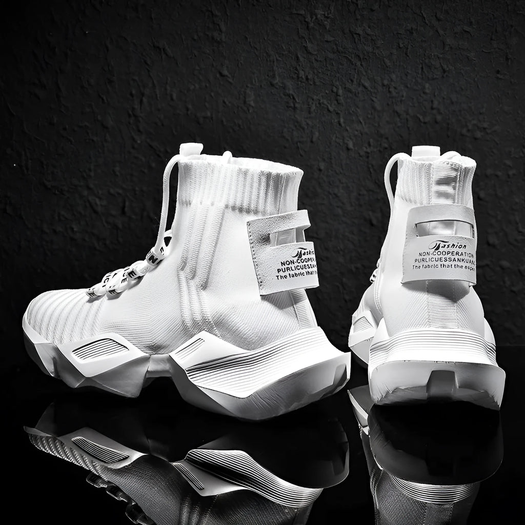 Men's black and white sports-style casual shoes with mesh lining, shown in large sizes.