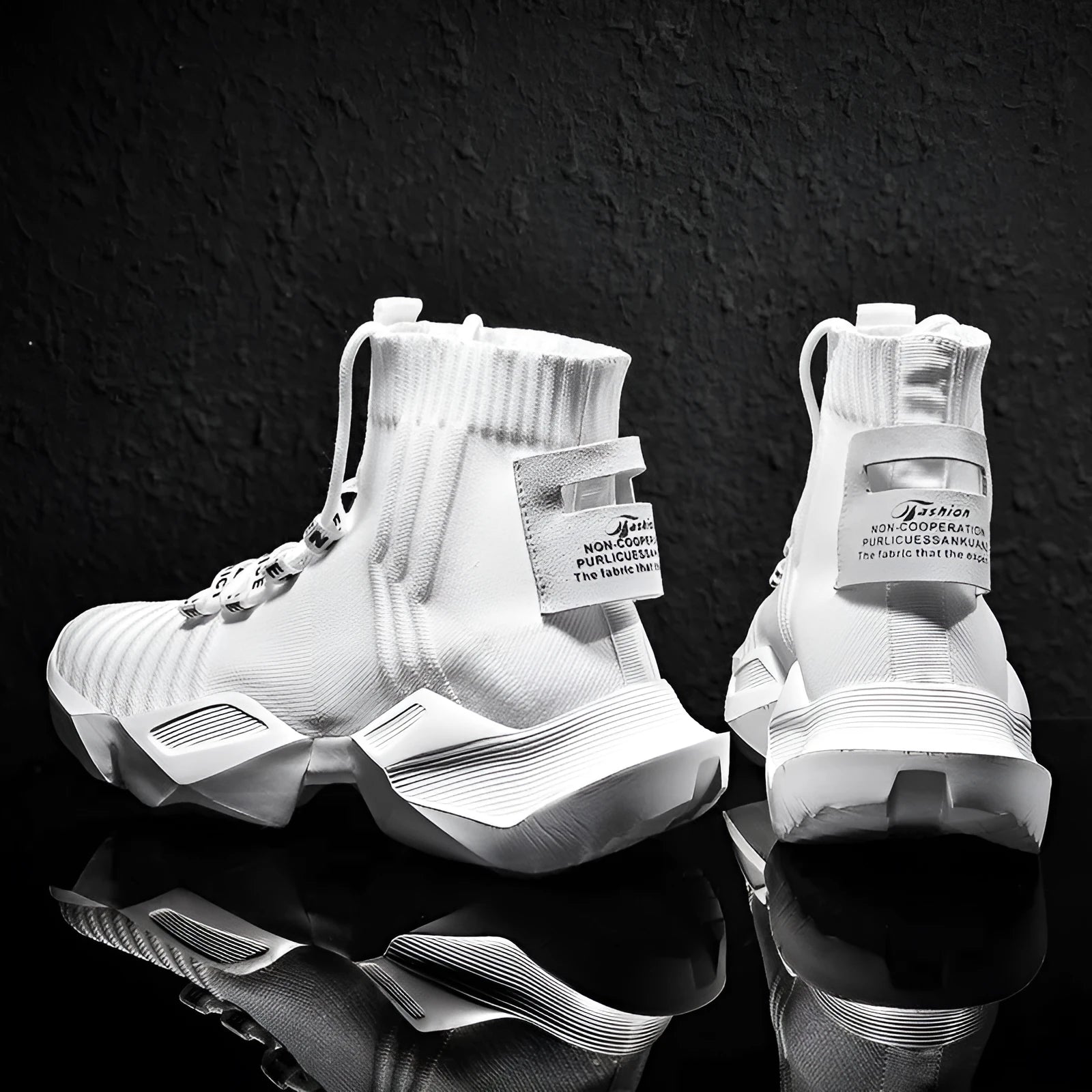 Men's black and white sports-style casual shoes with mesh lining, shown in large sizes.
