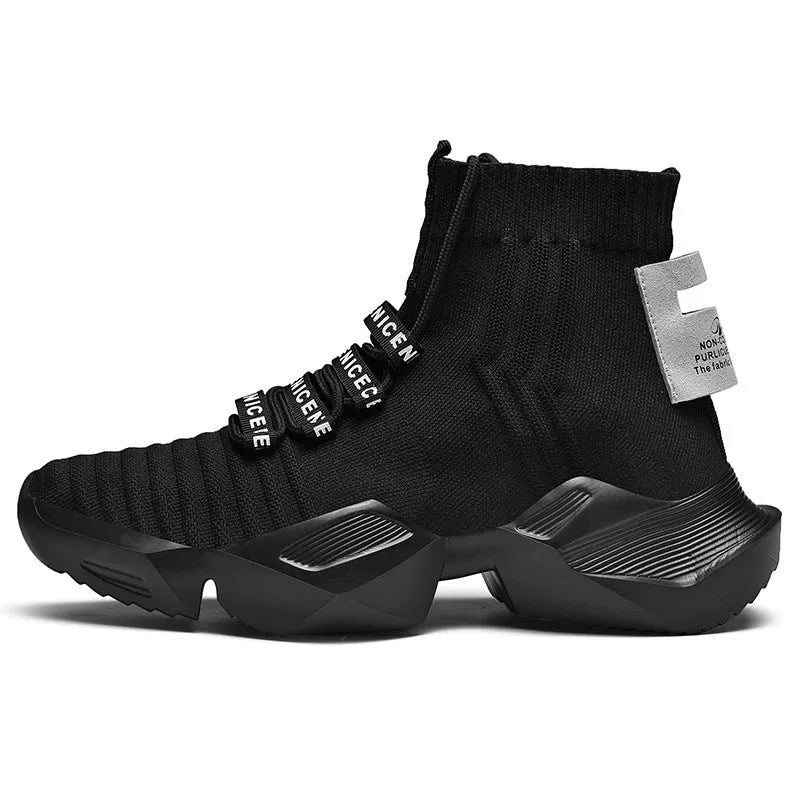 Men's black and white sports-style casual shoes with mesh lining, shown in large sizes.