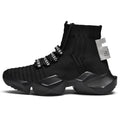 Men's black and white sports-style casual shoes with mesh lining, shown in large sizes.