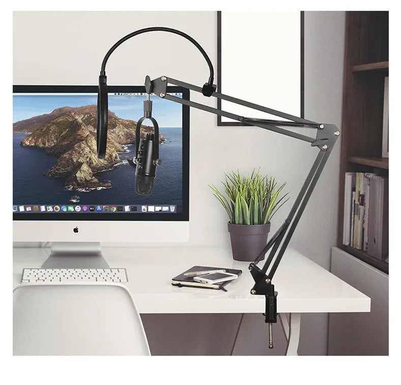 Black USB condenser microphone on metal stand with sponge cover