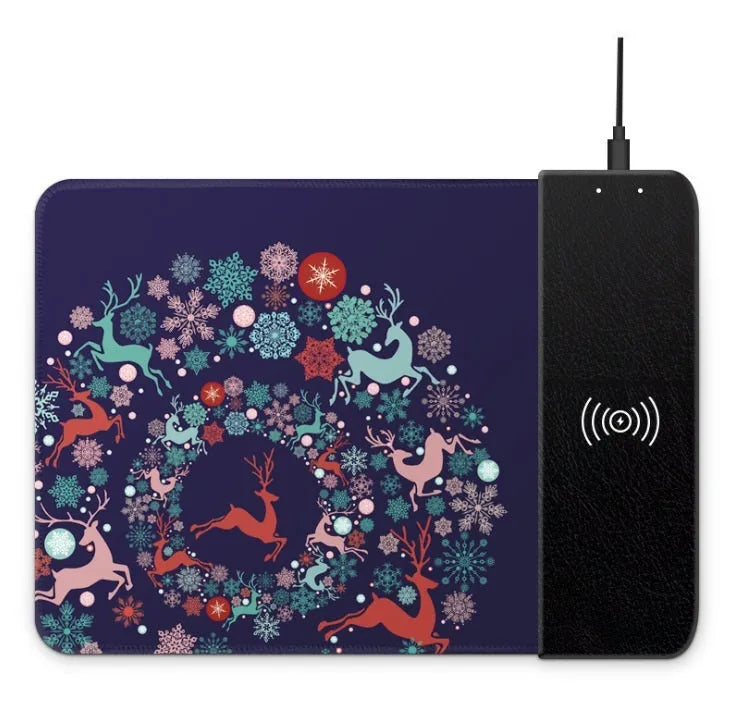 Black wireless charging mouse pad with RGB lighting on a desk, showing cloth surface and rubber base.
