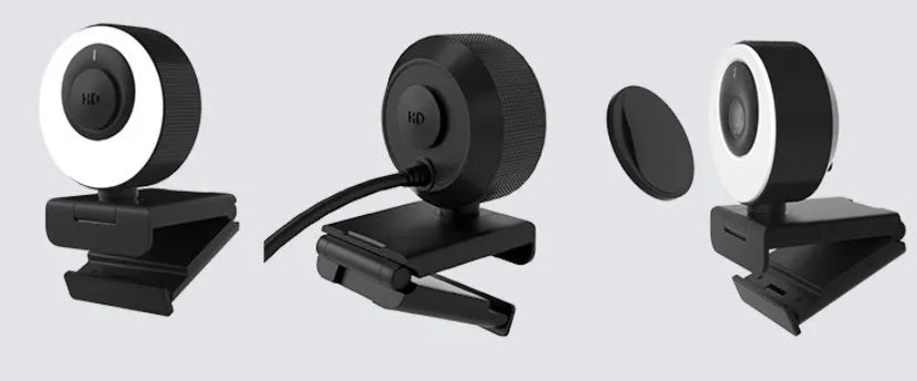 Black USB webcam on a desk with magnetic privacy cover and 1.7m cable