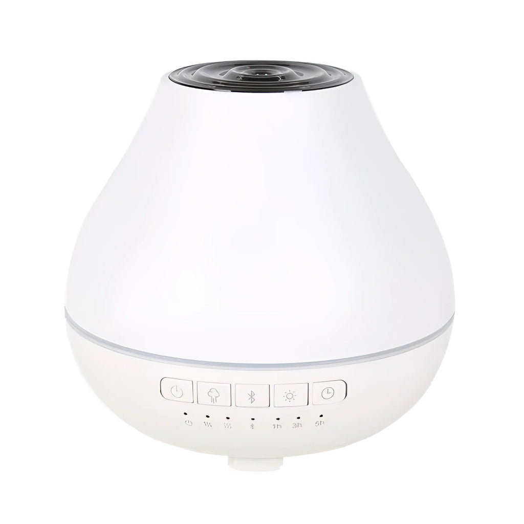 White circular Bluetooth humidifier and aroma diffuser with night light on a table.