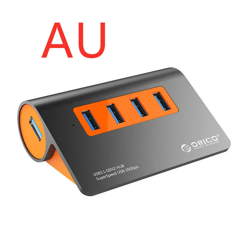 Dark grey and orange aluminium USB 3.1 hub with four ports and individual power switches