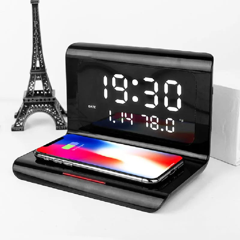 Wireless charger alarm clock with digital display showing time, date, temperature and humidity