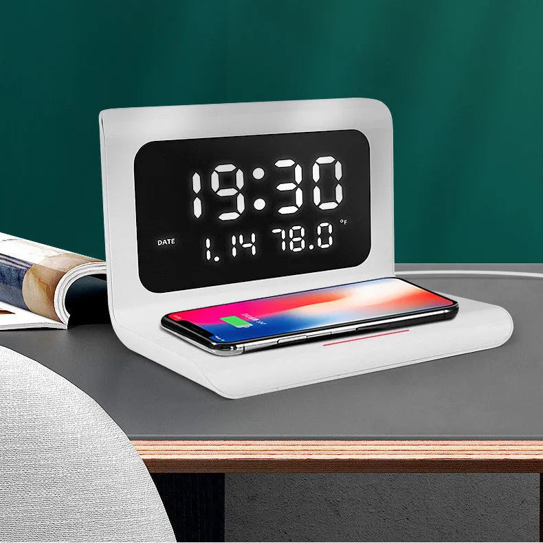 Wireless charger alarm clock with digital display showing time, date, temperature and humidity