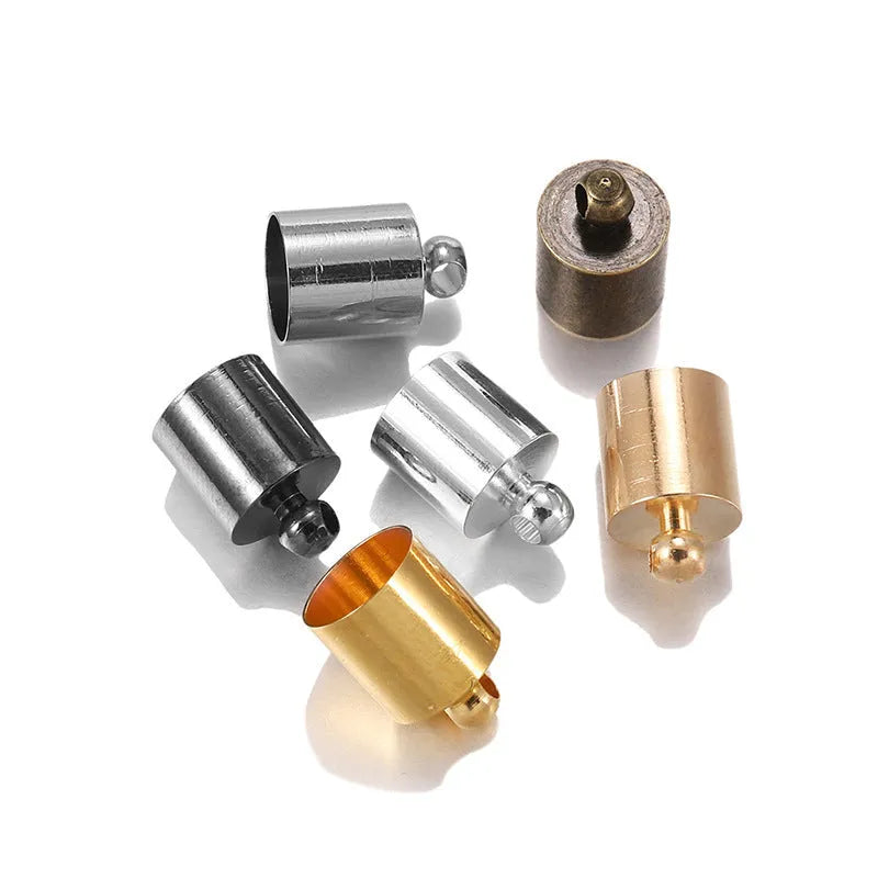 Assortment of multi-colour copper caps in gold, silver, black, and bronze finishes for jewellery making.