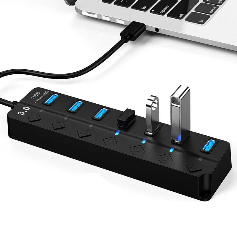 Black 7-port USB 3.0 hub with external power supply for desktop computer expansion
