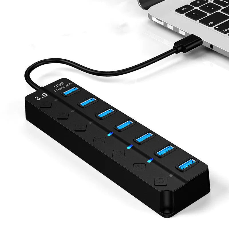 Black 7-port USB 3.0 hub with external power supply for desktop computer expansion