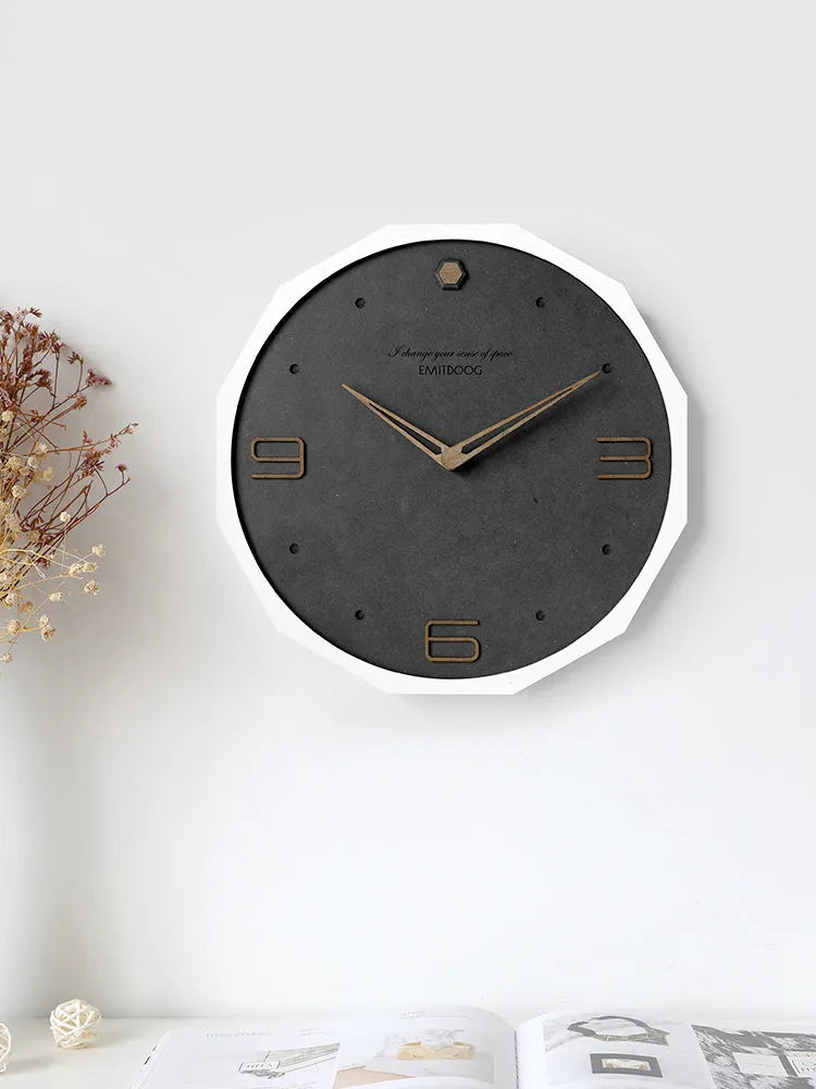 12-inch round wall clock in Geralt material with Nordic minimalist design and perforated details