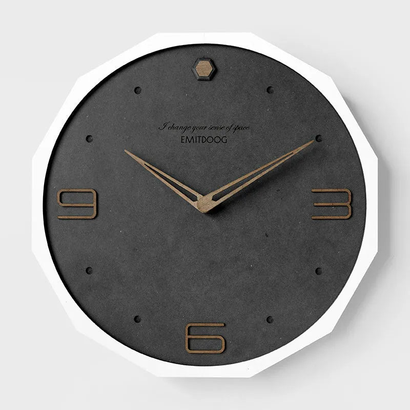 12-inch round wall clock in Geralt material with Nordic minimalist design and perforated details