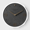12-inch round wall clock in Geralt material with Nordic minimalist design and perforated details