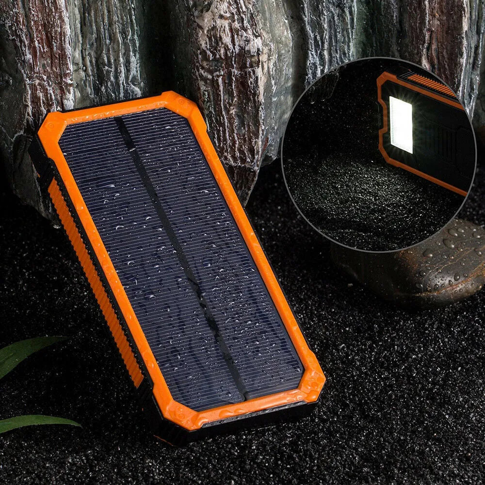 Orange Three Proofs solar power bank showing USB ports and solar panel, size 161x79x17mm.