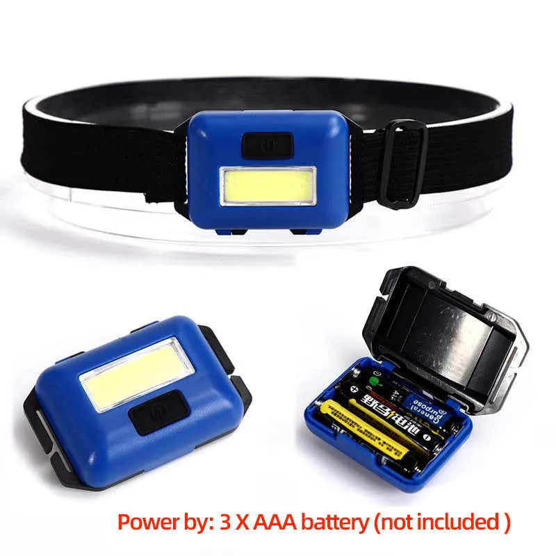 Outdoor mini COB LED headlamp in black, blue, or red on adjustable polyester strap.