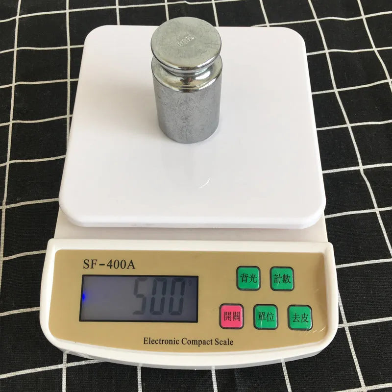 SF-400A model digital electronic kitchen scale on a counter with a bowl, showing a 10kg capacity and digital display.