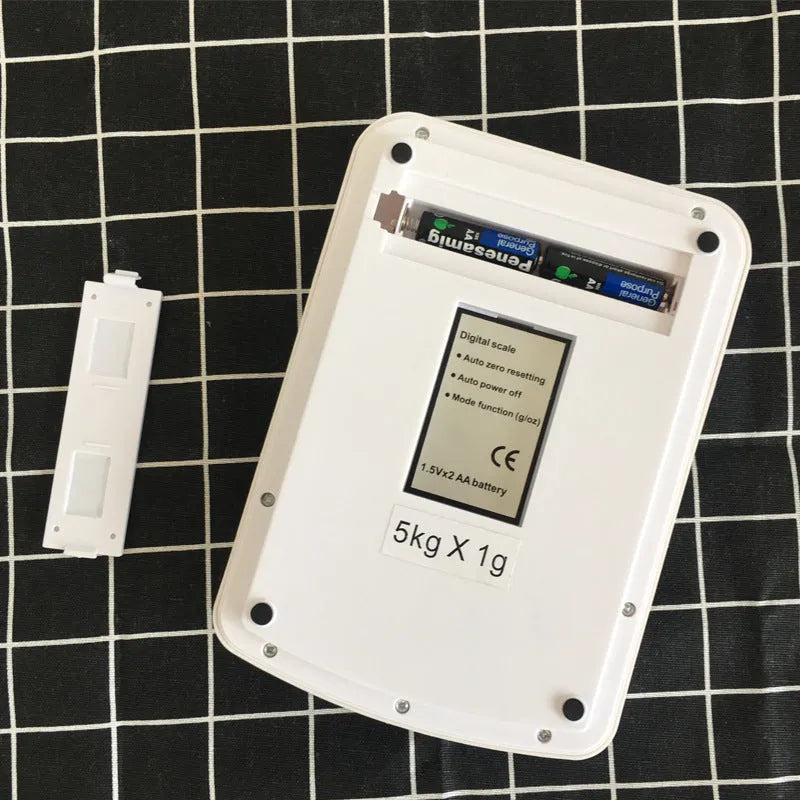 SF-400A model digital electronic kitchen scale on a counter with a bowl, showing a 10kg capacity and digital display.