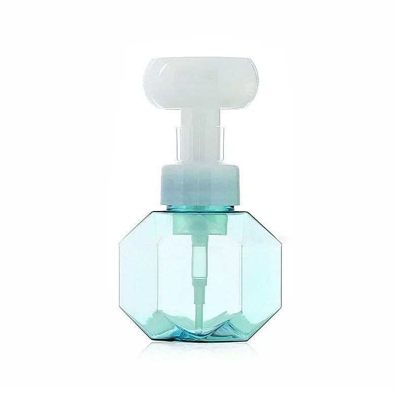 Empty foaming bottle with non-woven fabric exterior, available in pink, green, blue, and yellow