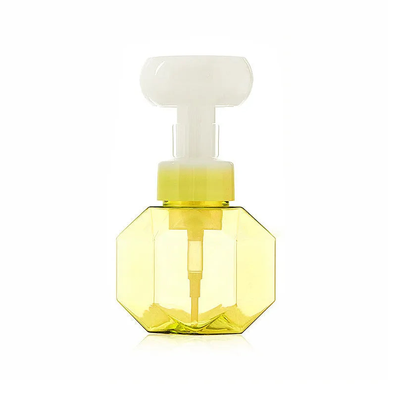 Empty foaming bottle with non-woven fabric exterior, available in pink, green, blue, and yellow