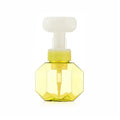 Empty foaming bottle with non-woven fabric exterior, available in pink, green, blue, and yellow