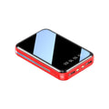 Compact digital display power bank in multiple colours showing battery percentage on screen