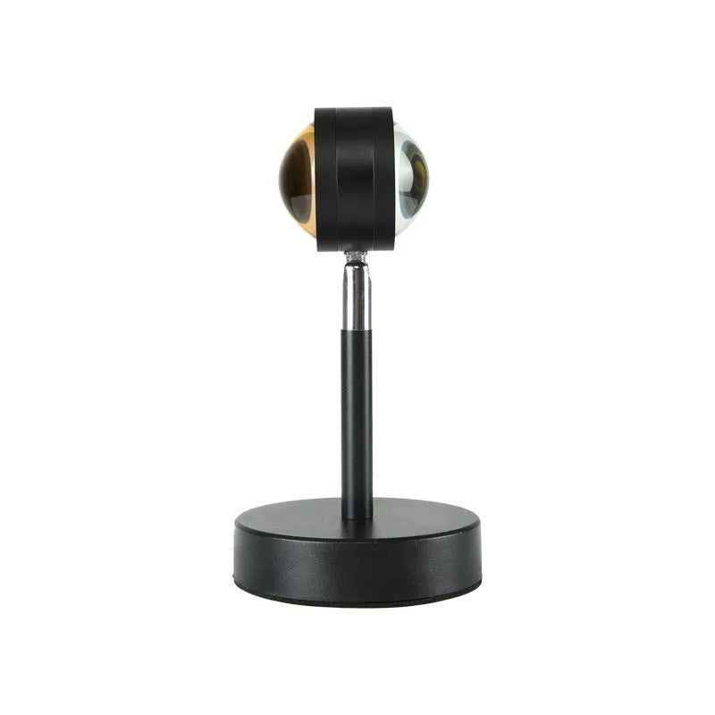 Black USB dual-head sunset rainbow projection lamp with touch controls on table