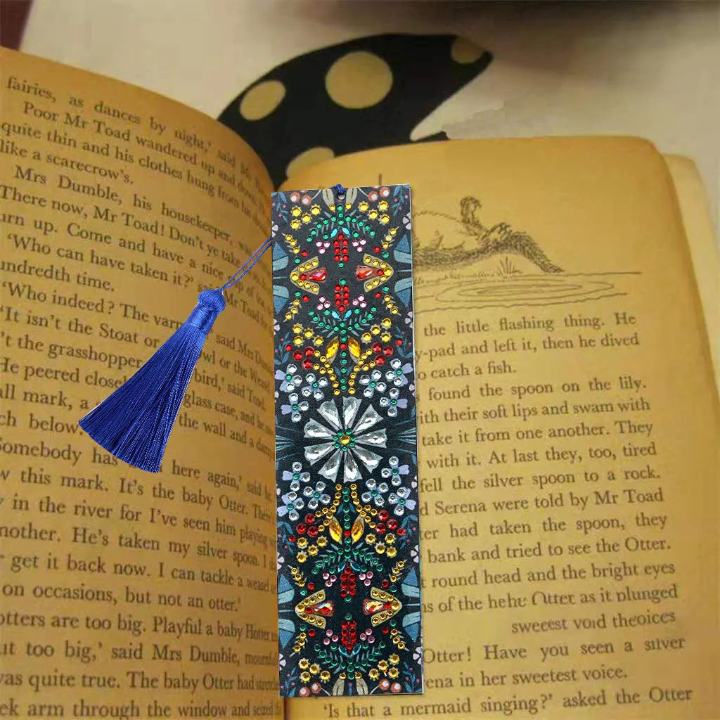 Handcrafted leather bookmark with diamond mandala flower embroidery.