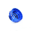 Blue aluminium alloy bicycle chainring removal tool for 12-speed direct mount disc systems with a wrench.