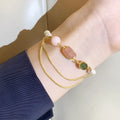 Women's freshwater pearl bracelet with geometric strawberry crystal charms in UG309 pink