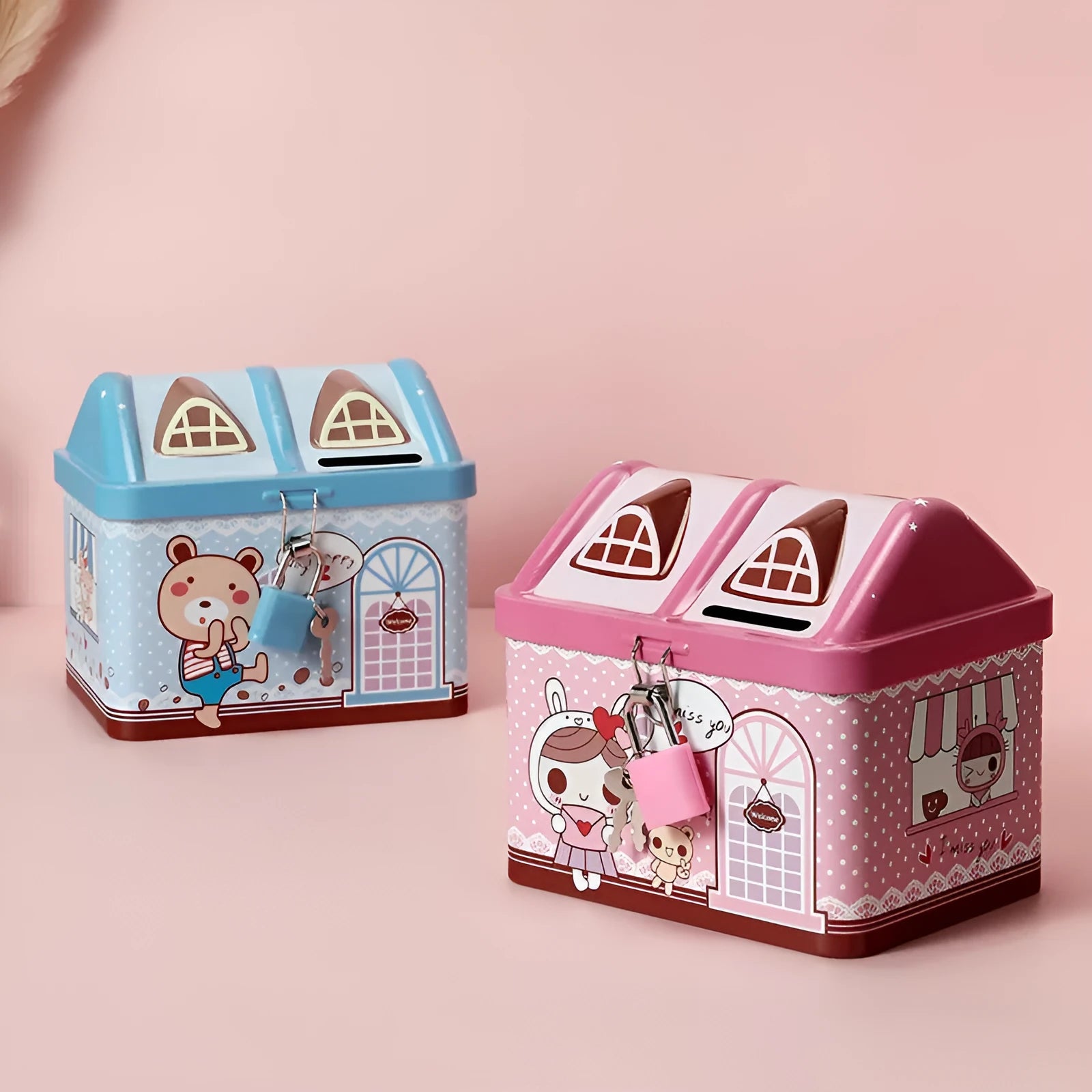 Blue house-shaped tinplate piggy bank with round coin slot on desktop.