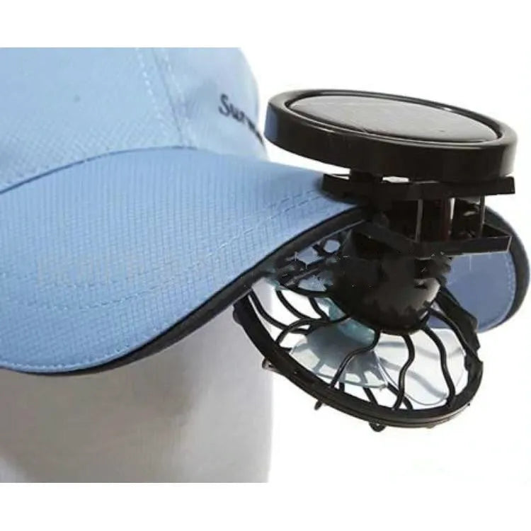 Black portable solar fan with clip-on mount and solar panel for outdoor cooling.