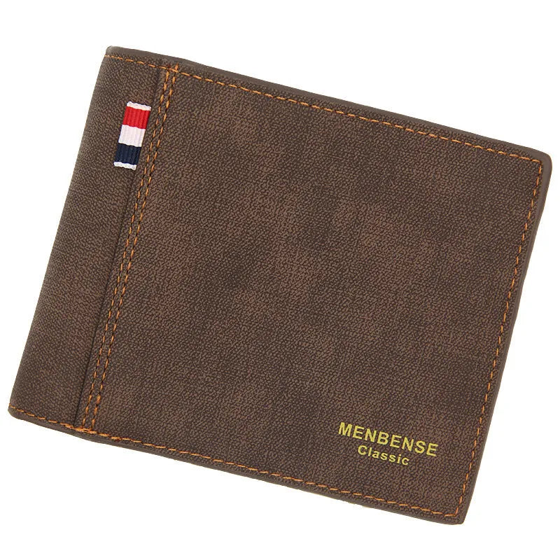 Men's black tri-fold leather wallet open showing card slots and cash compartment