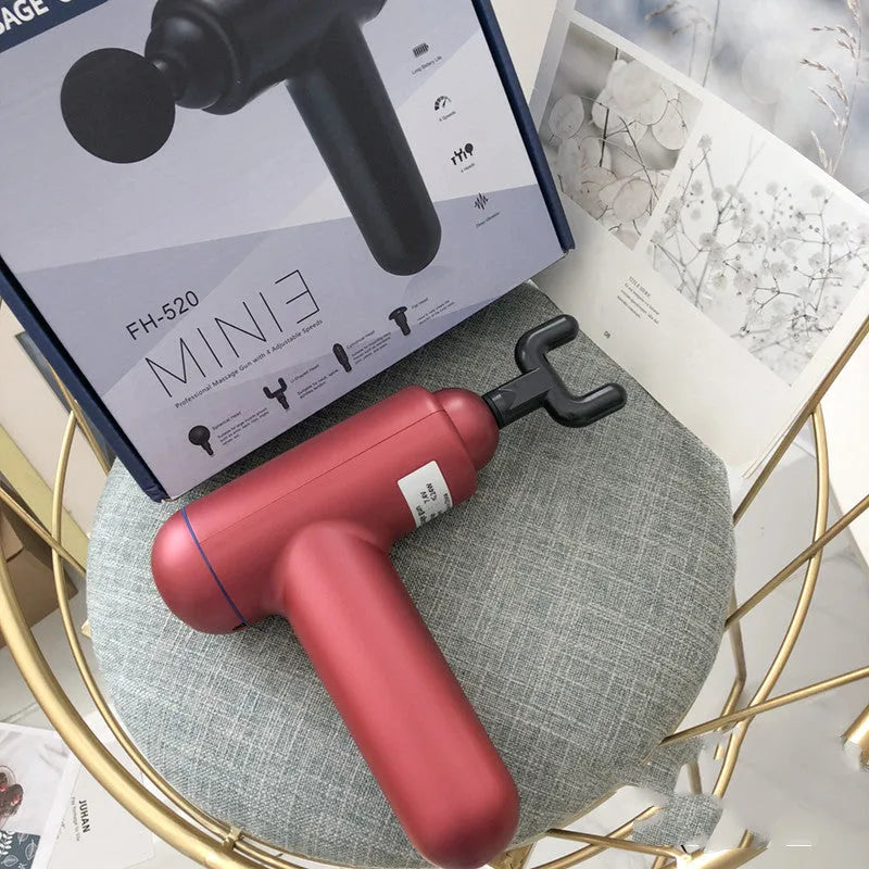 God fascia gun muscle massager in black, red, or grey colour with USB cable for power.