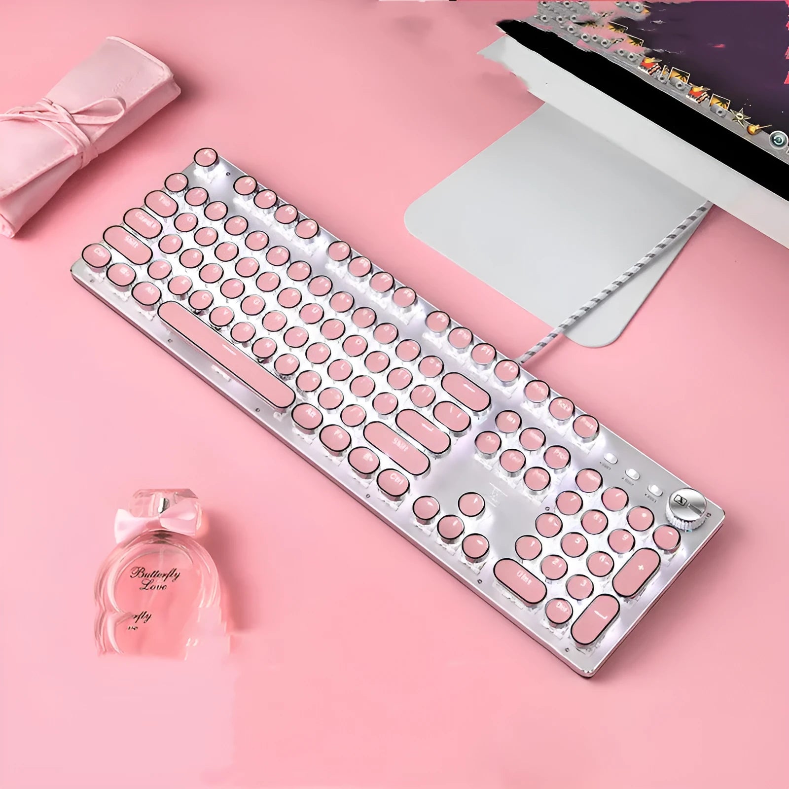Queen Lipstick mechanical keyboard with round keys, silver base and pink backlight