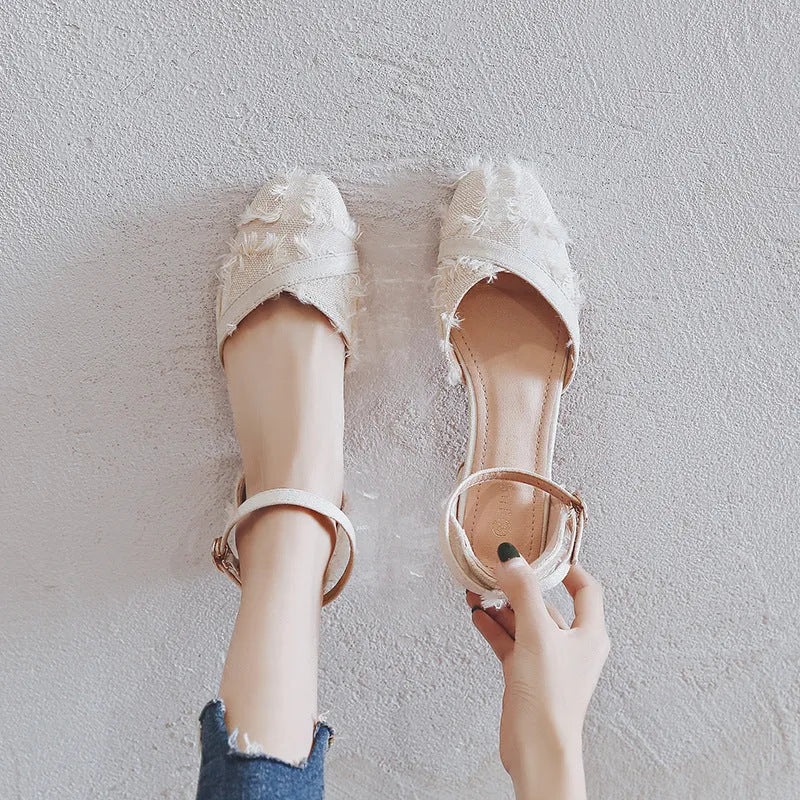 Women's apricot suede Dorsay flats with an ankle strap and a low rubber sole.