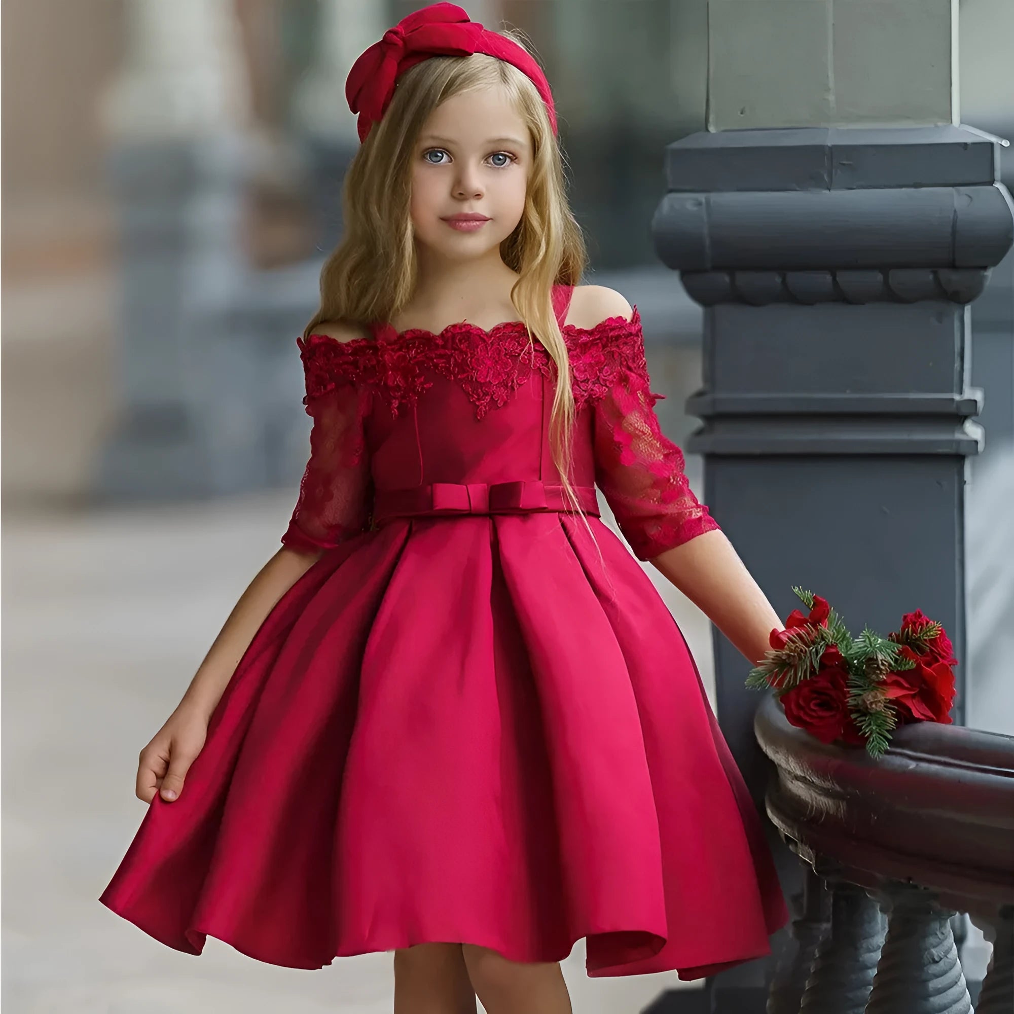 Simple lace-trimmed girls dress in polyester fibre, shown in dark red, green, pink, red or white.