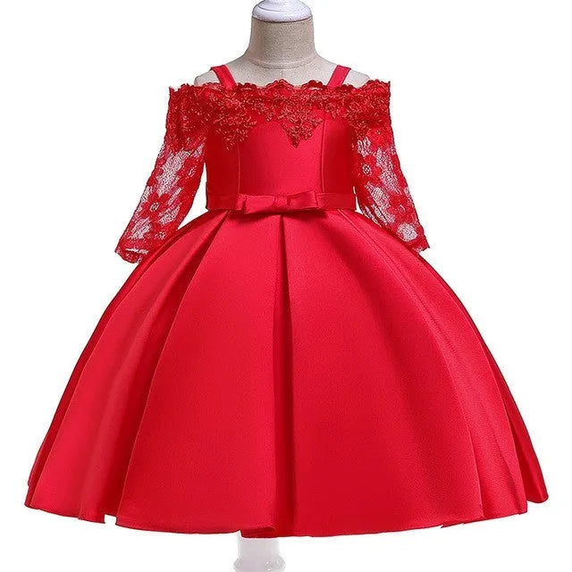 Simple lace-trimmed girls dress in polyester fibre, shown in dark red, green, pink, red or white.