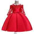 Simple lace-trimmed girls dress in polyester fibre, shown in dark red, green, pink, red or white.