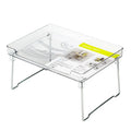 A transparent and a white plastic kitchen supplies rack for desktop or cupboard organisation.