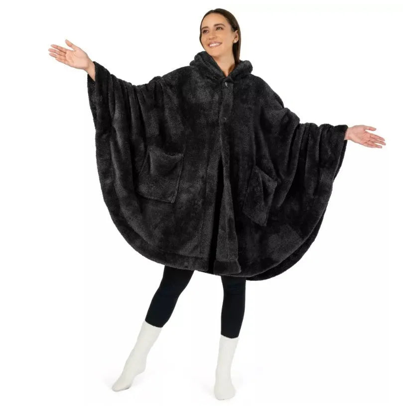 A thick pink hooded bathrobe with long sleeves and a cardigan-style front, laid flat.