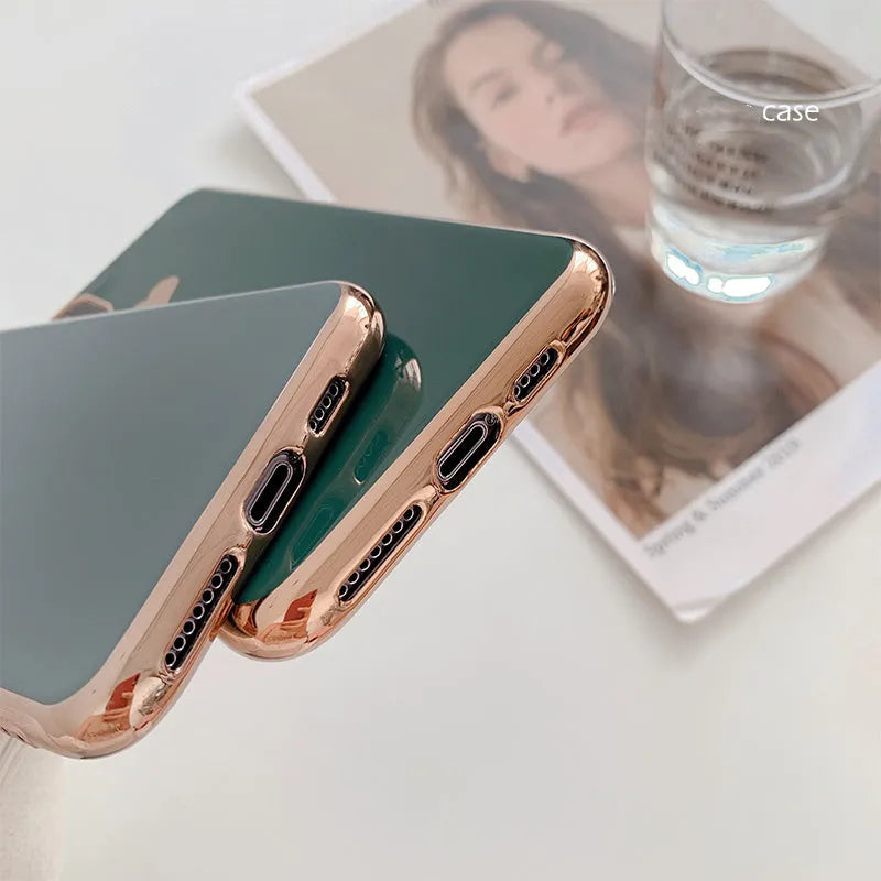 Solid colour TPU smartphone back cover case for iPhone models on a plain background.