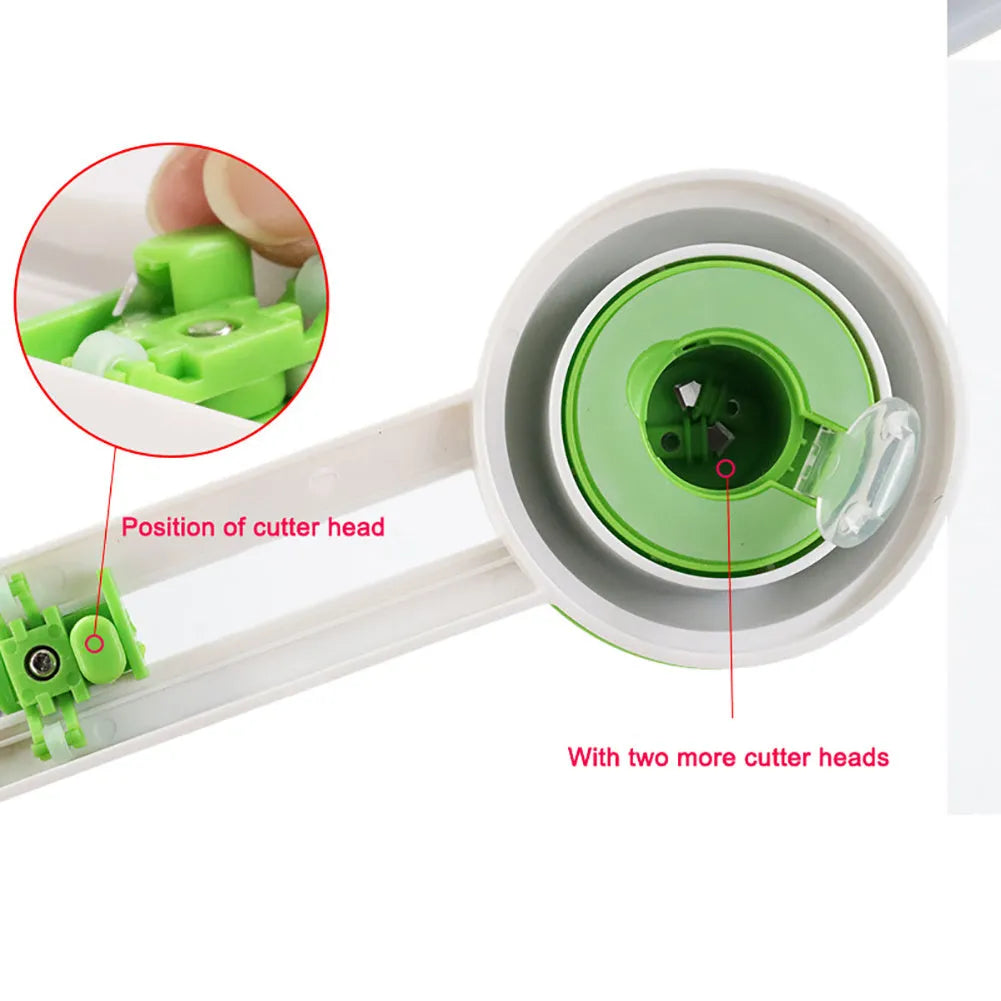 Orange and green plastic round paper cutter for A3 sheets on a table.