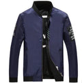Men's reversible flight jacket showing dual colour options in black, blue, or green stripe patterns for casual autumn and winter wear