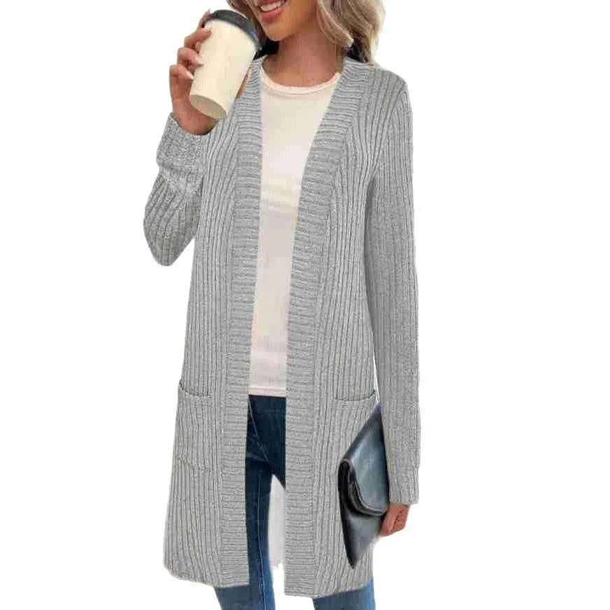 A loose-fitting long sleeve knitted cardigan jacket with pockets, shown in black, wine red, and grey colours.