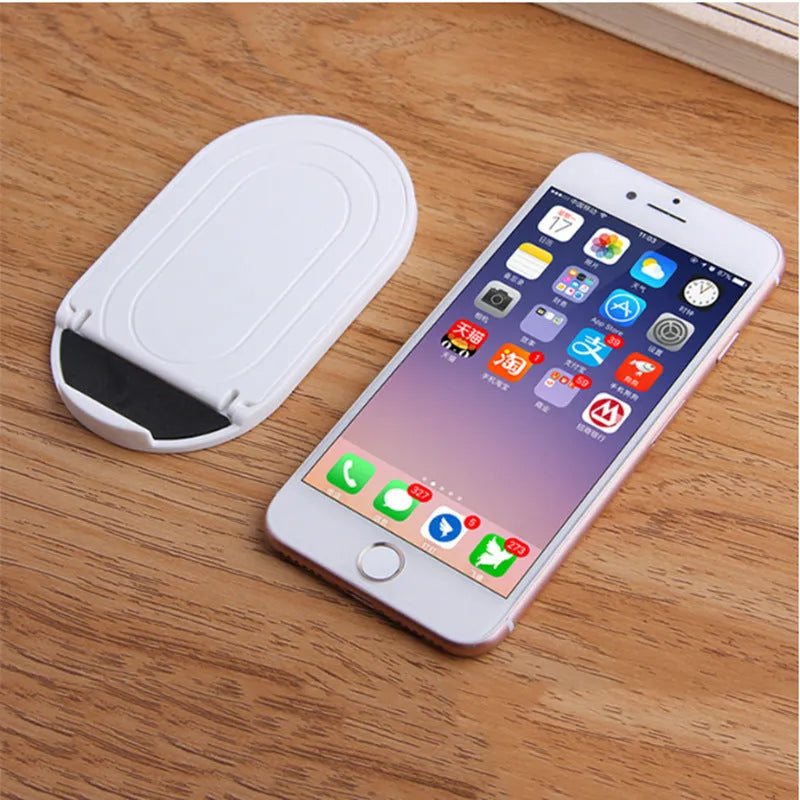 Plastic mobile phone stand with lazy bracket design in six colour options on white background