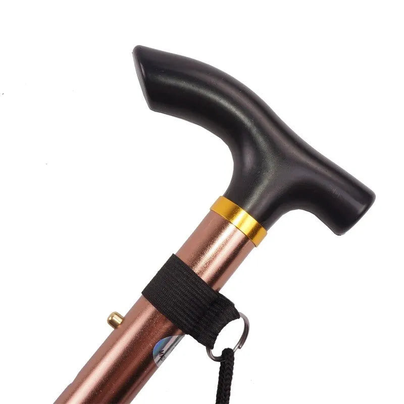 Adjustable aluminium folding walking cane in silver extended to show length, with non-slip handle.