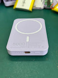 White magnetic wireless charger power bank with 5000mAh capacity and compact design