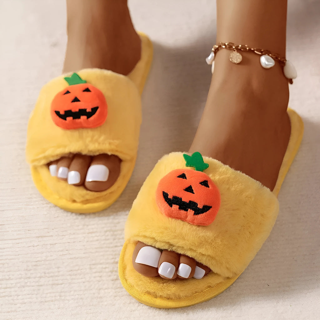 Yellow pumpkin cartoon plush slippers with synthetic fur upper and PVC sole, open toe design.