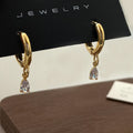 Zircon jewellery set showing necklace, earrings and anklet with geometric meteor shower design